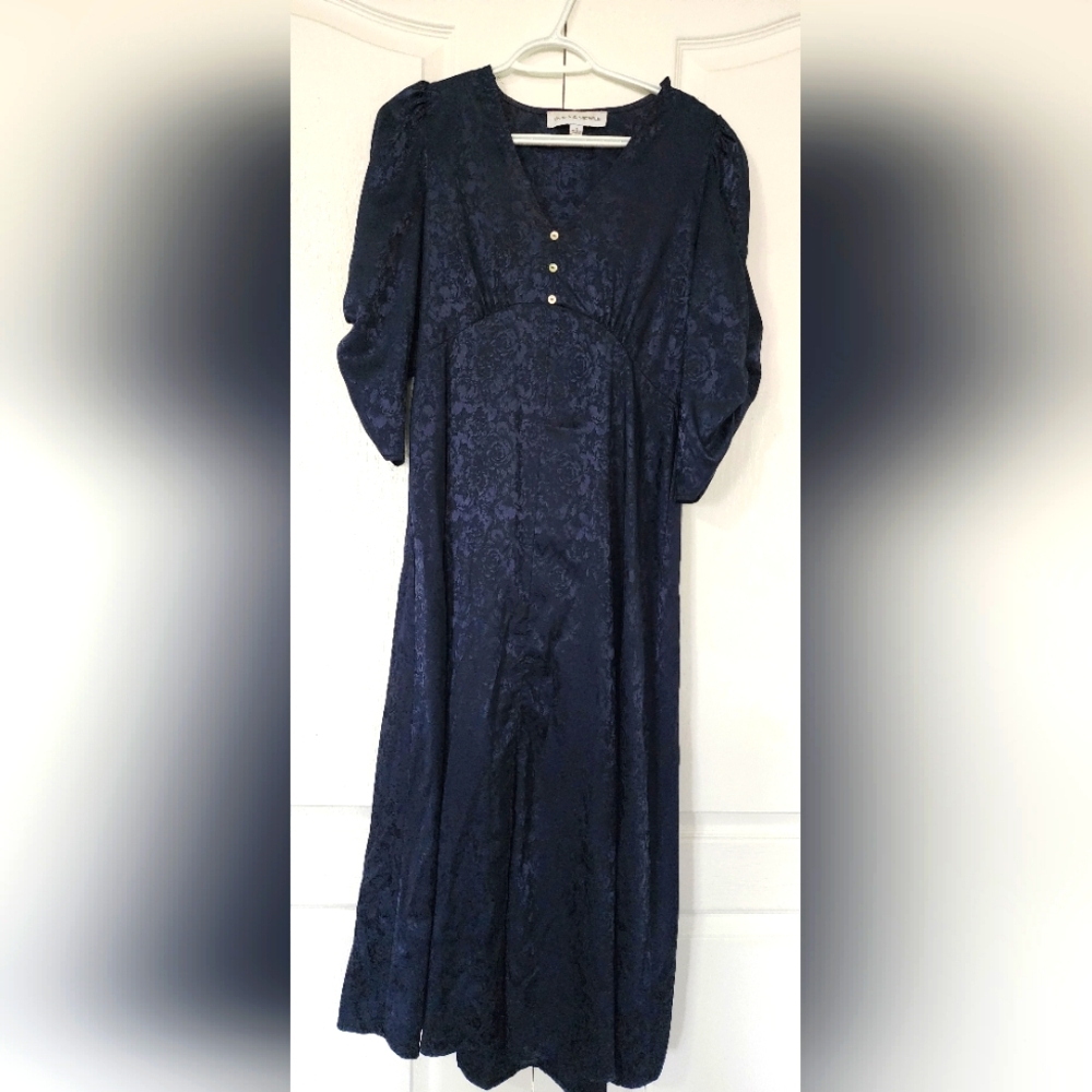 Dress navy blue Small size but runs a little big...